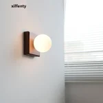 North American walnut ball wall lamp minimalist hotel living room background wall bedside wood lamp 2
